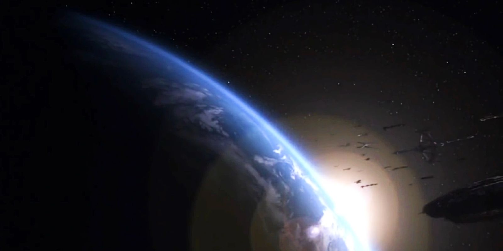 Une flotte de vaisseaux s'approchant de la Terre dans la finale de la série Battlestar Galactica.