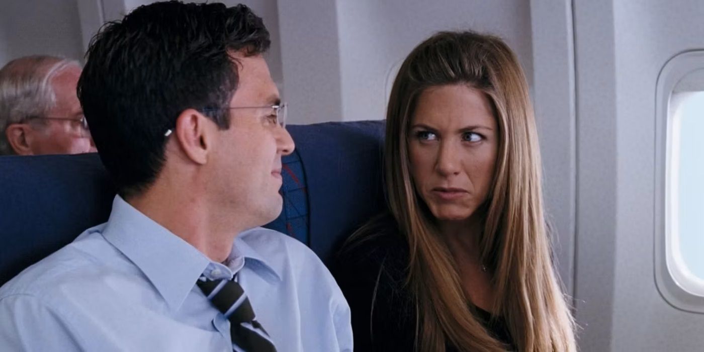 Jennifer Aniston dans le rôle de Sarah et Mark Ruffalo dans le rôle de Jeff dans un avion dans Rumor Has It...